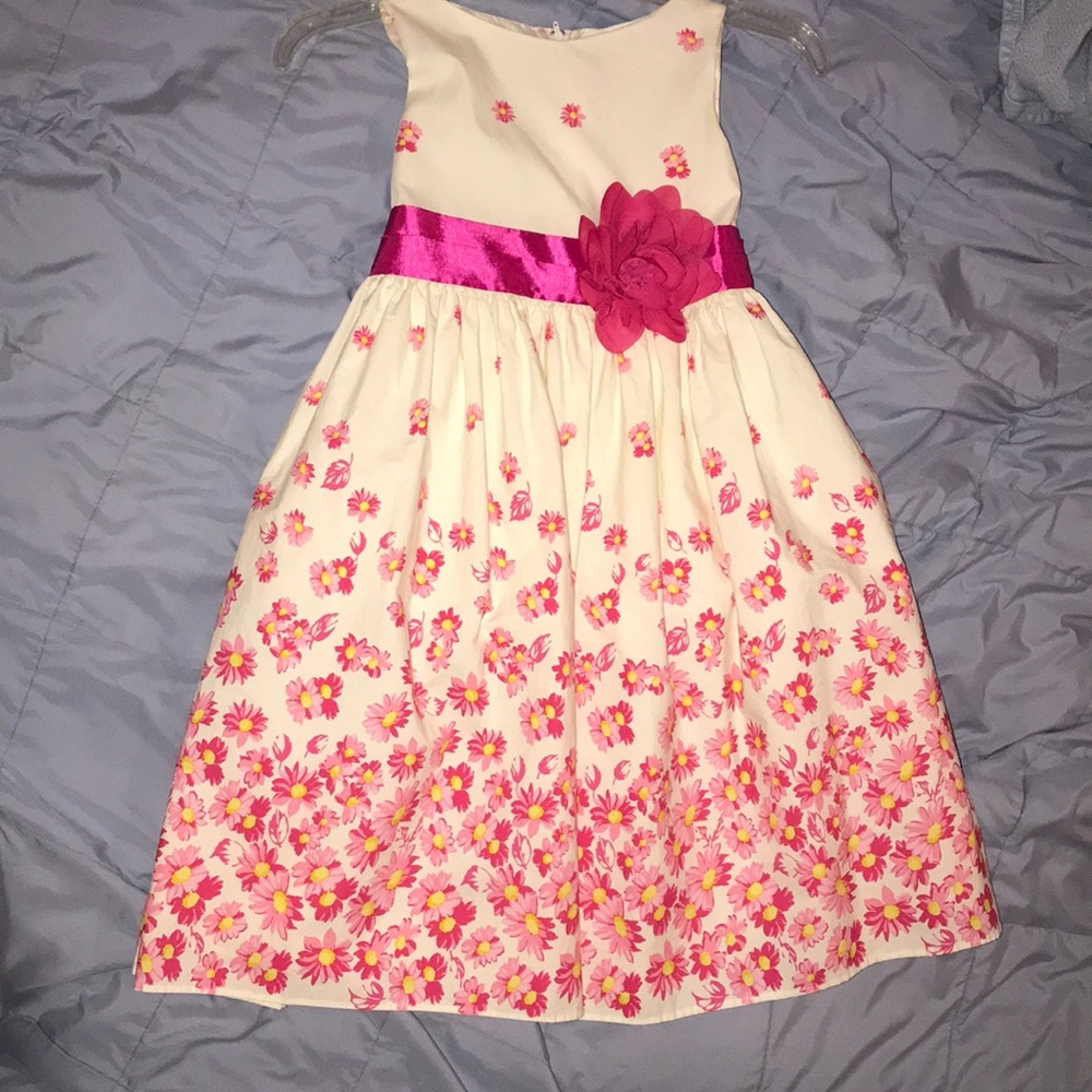 Girl’s cream and pink dress